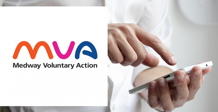 A man tapping his phone screen. Alongside the image is the Medway Voluntary Action logo. 