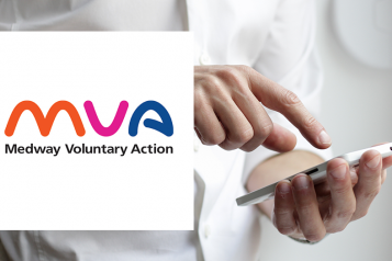 A man tapping his phone screen. Alongside the image is the Medway Voluntary Action logo. 